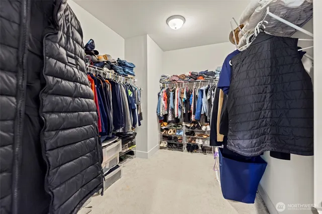 a bedroom with furniture and window