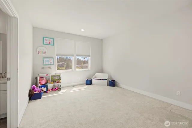 a en suite bathroom with a sink and a mirror