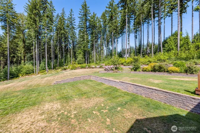 a swimming pool with wooden fence