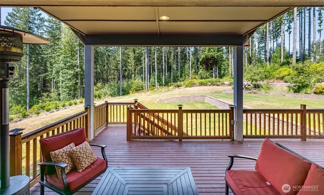 a view of a two chairs in the deck