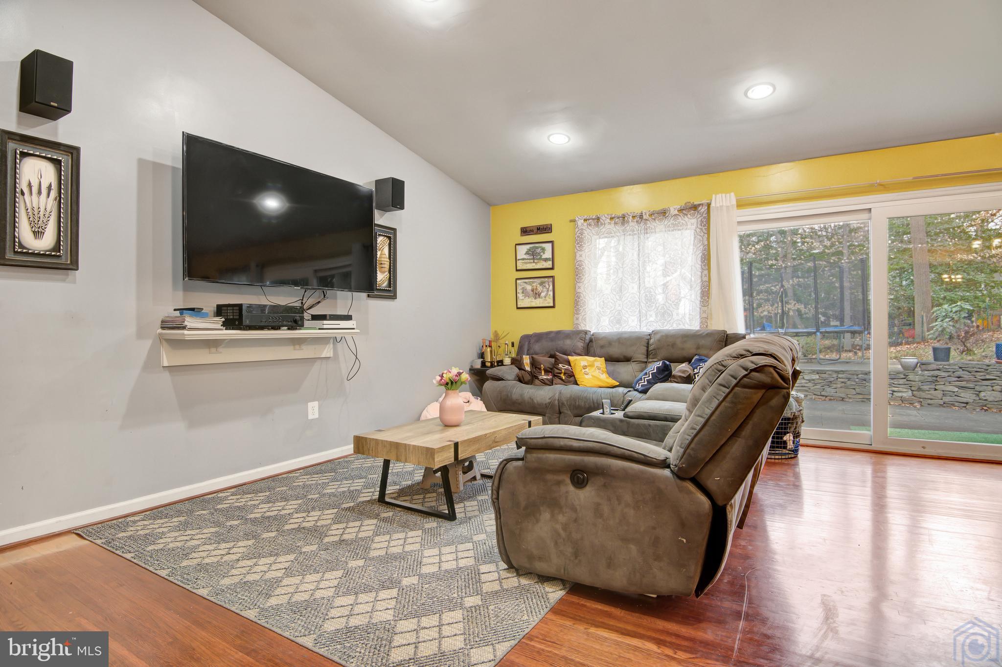 1002 La Grande Road Silver Spring, MD 20903 - Photo 13 of 33 Floor to ceiling windows in the living room!