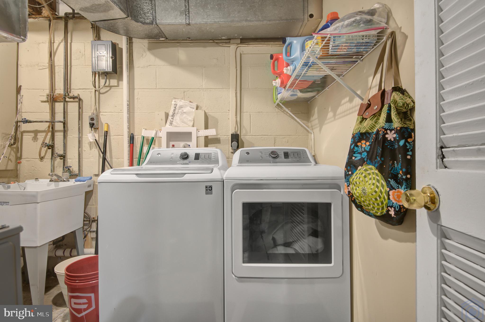 1002 La Grande Road Silver Spring, MD 20903 - Photo 22 of 33 Laundry room on mid-level - new W/D convey!