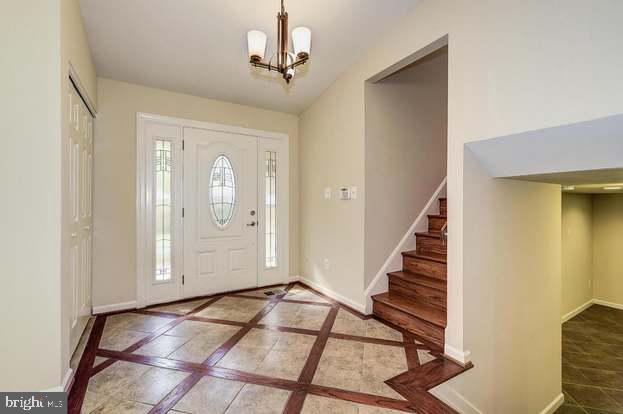 1002 La Grande Road Silver Spring, MD 20903 - Photo 7 of 33 Tall ceilings greet you as you walk into the foyer
