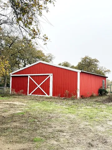 a view of a building with a street