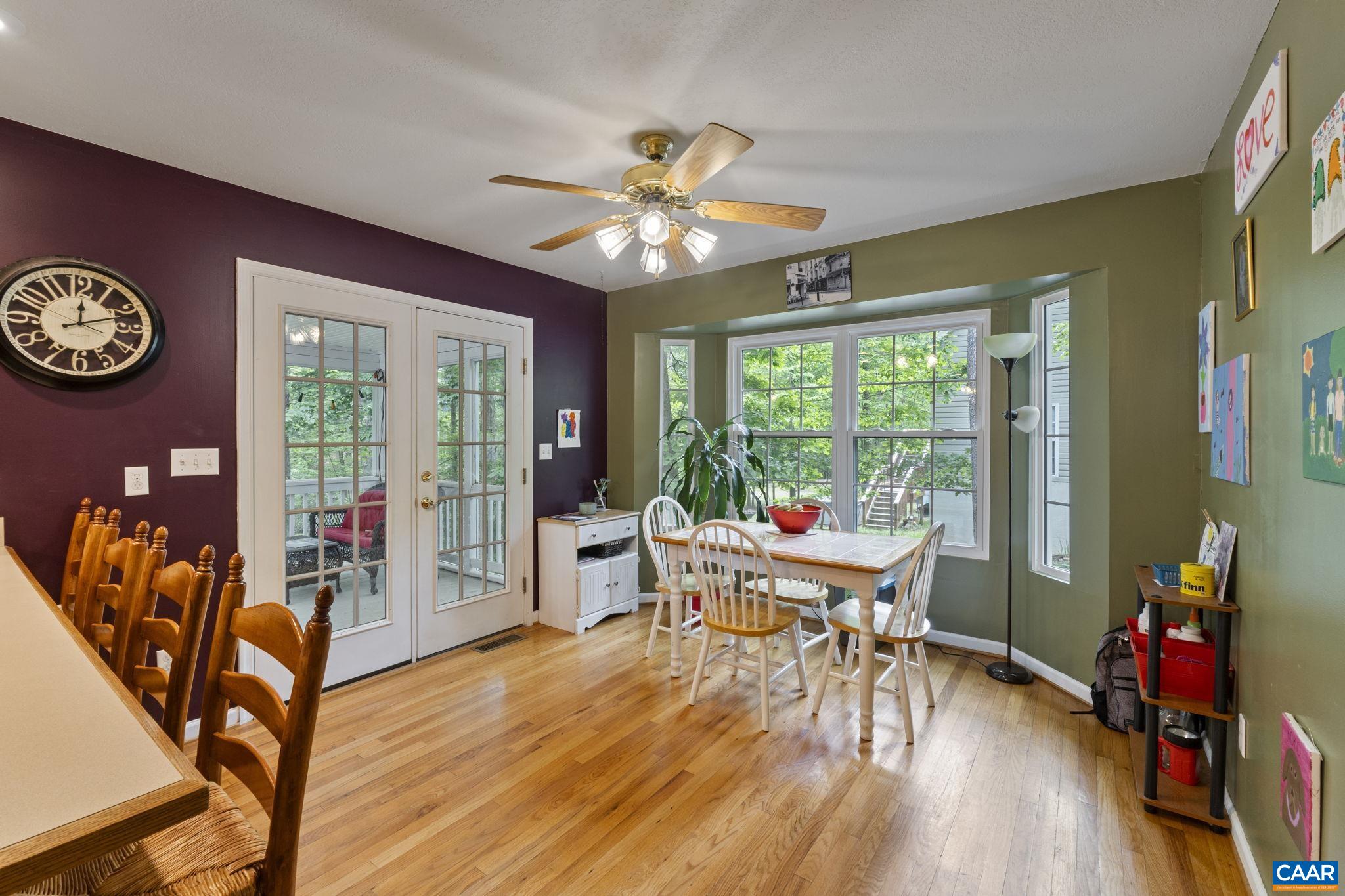 42 Oak Grove Road Palmyra, VA 22963 - Photo 18 of 37 a view of a dining room with furniture window and wooden floor