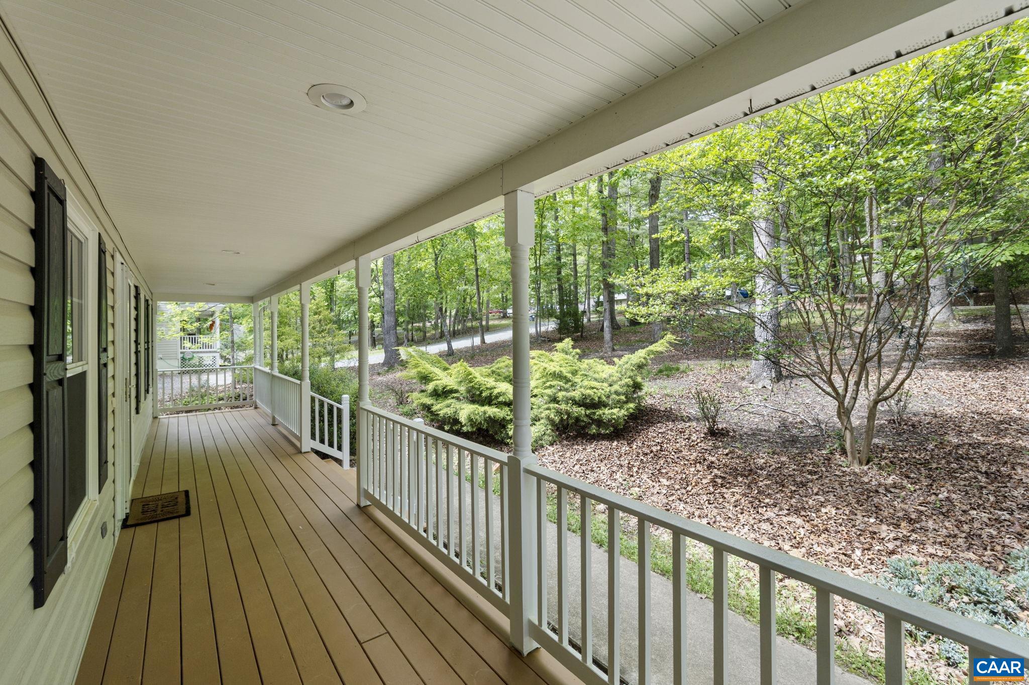 42 Oak Grove Road Palmyra, VA 22963 - Photo 2 of 37 a view of a porch with wooden floor and outdoor space