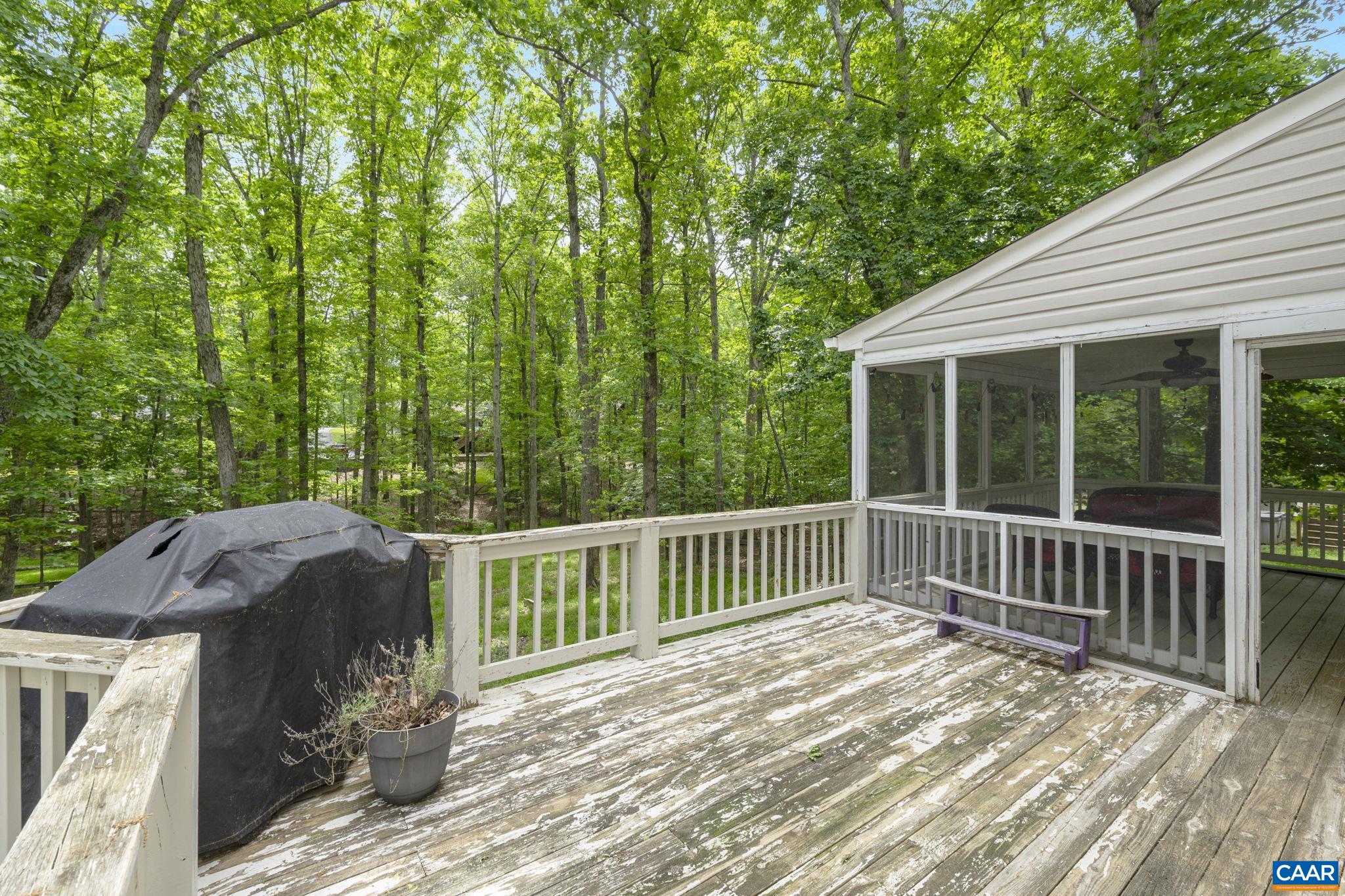 42 Oak Grove Road Palmyra, VA 22963 - Photo 22 of 37 a view of a two chairs and table in the balcony