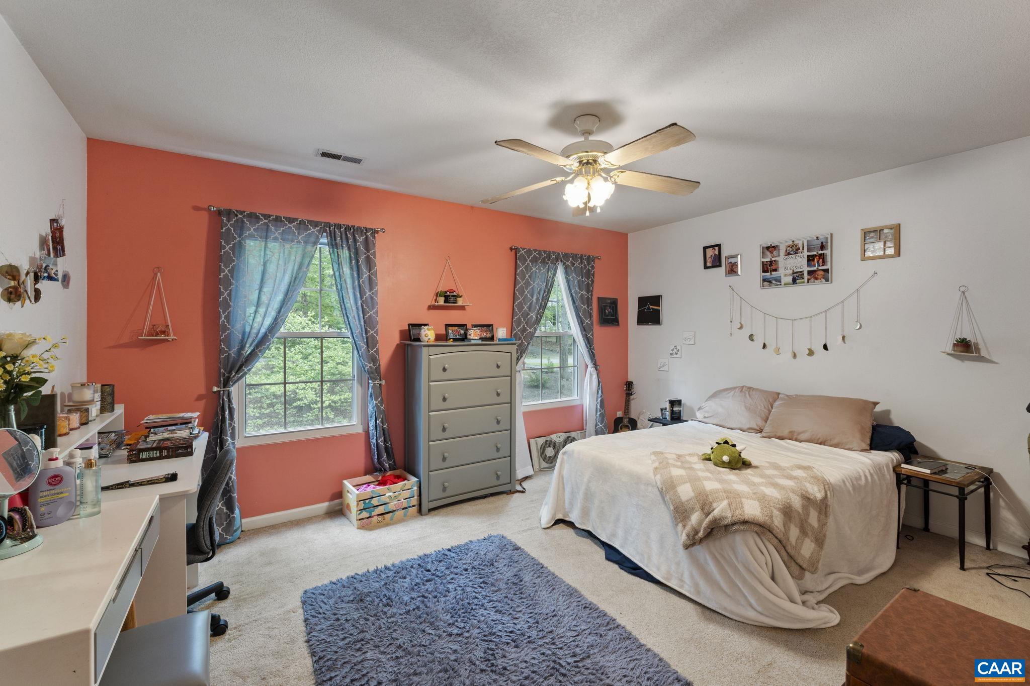 42 Oak Grove Road Palmyra, VA 22963 - Photo 25 of 37 a bedroom with a bed dresser and a window