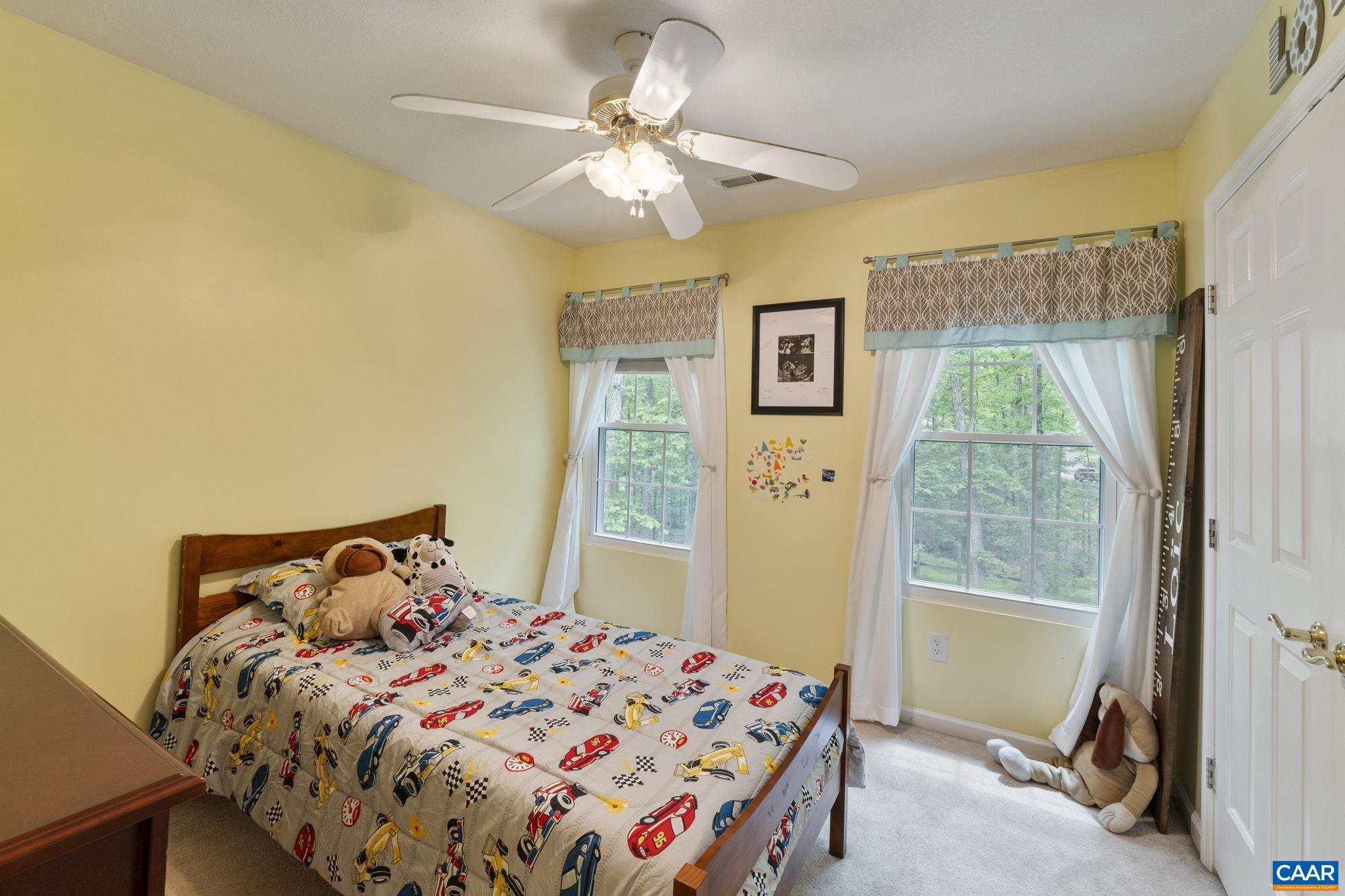 42 Oak Grove Road Palmyra, VA 22963 - Photo 27 of 37 a bedroom with a bed and a window
