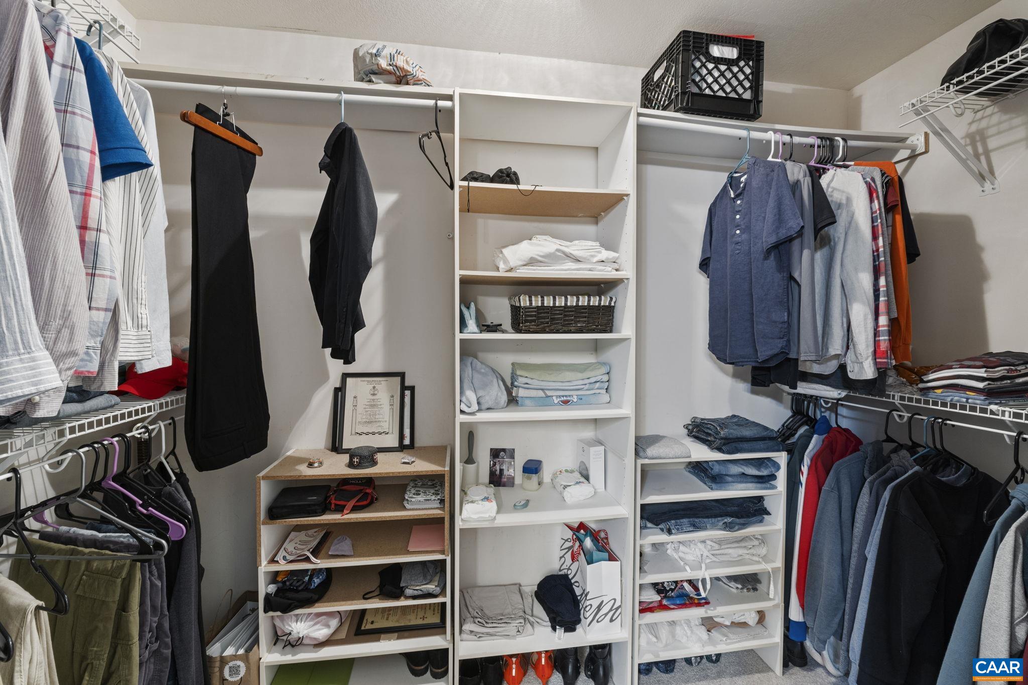 42 Oak Grove Road Palmyra, VA 22963 - Photo 31 of 37 a view of walk in closet with clothes and shoes