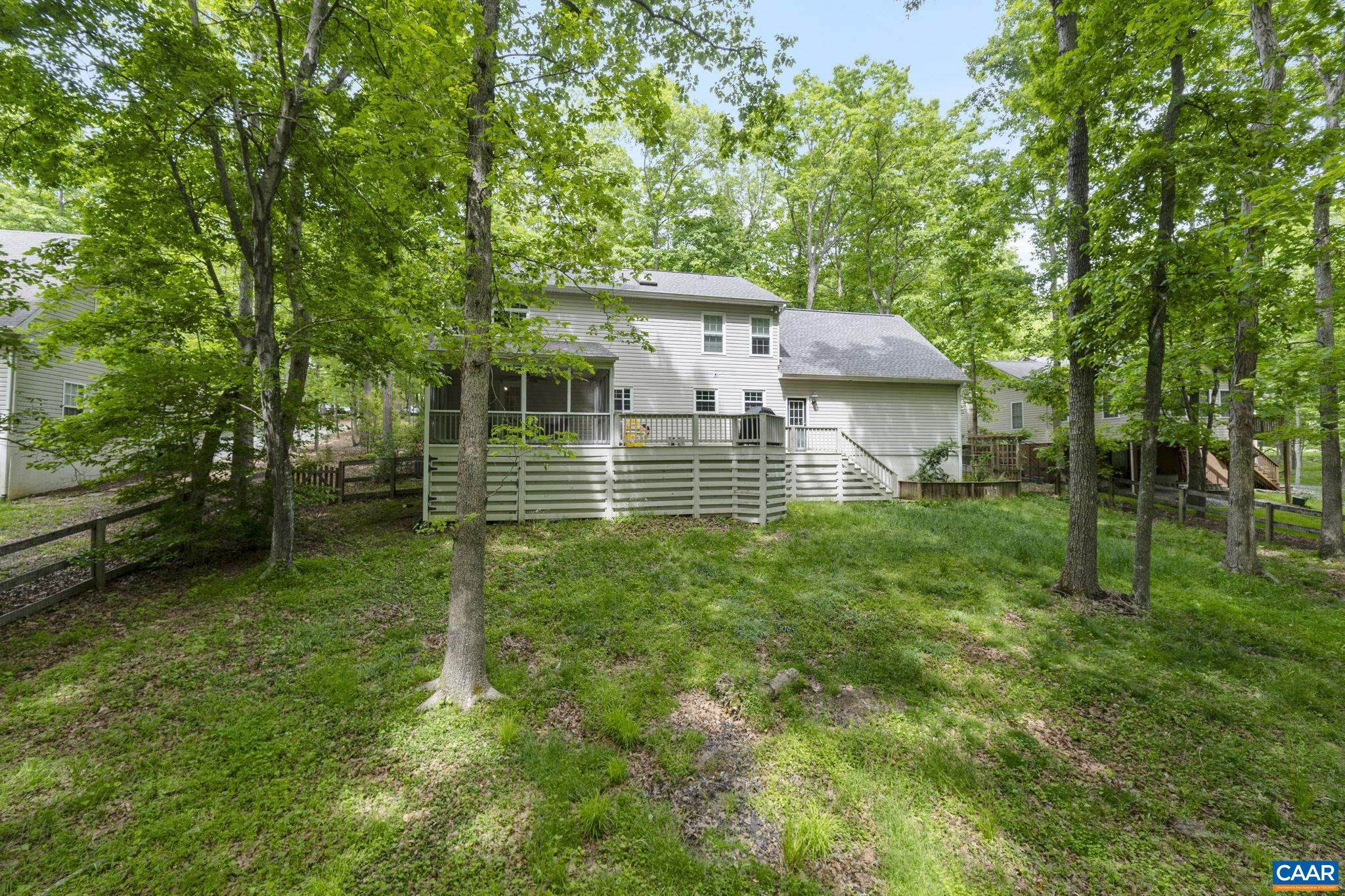 42 Oak Grove Road Palmyra, VA 22963 - Photo 37 of 37 a view of a house with a yard and large trees