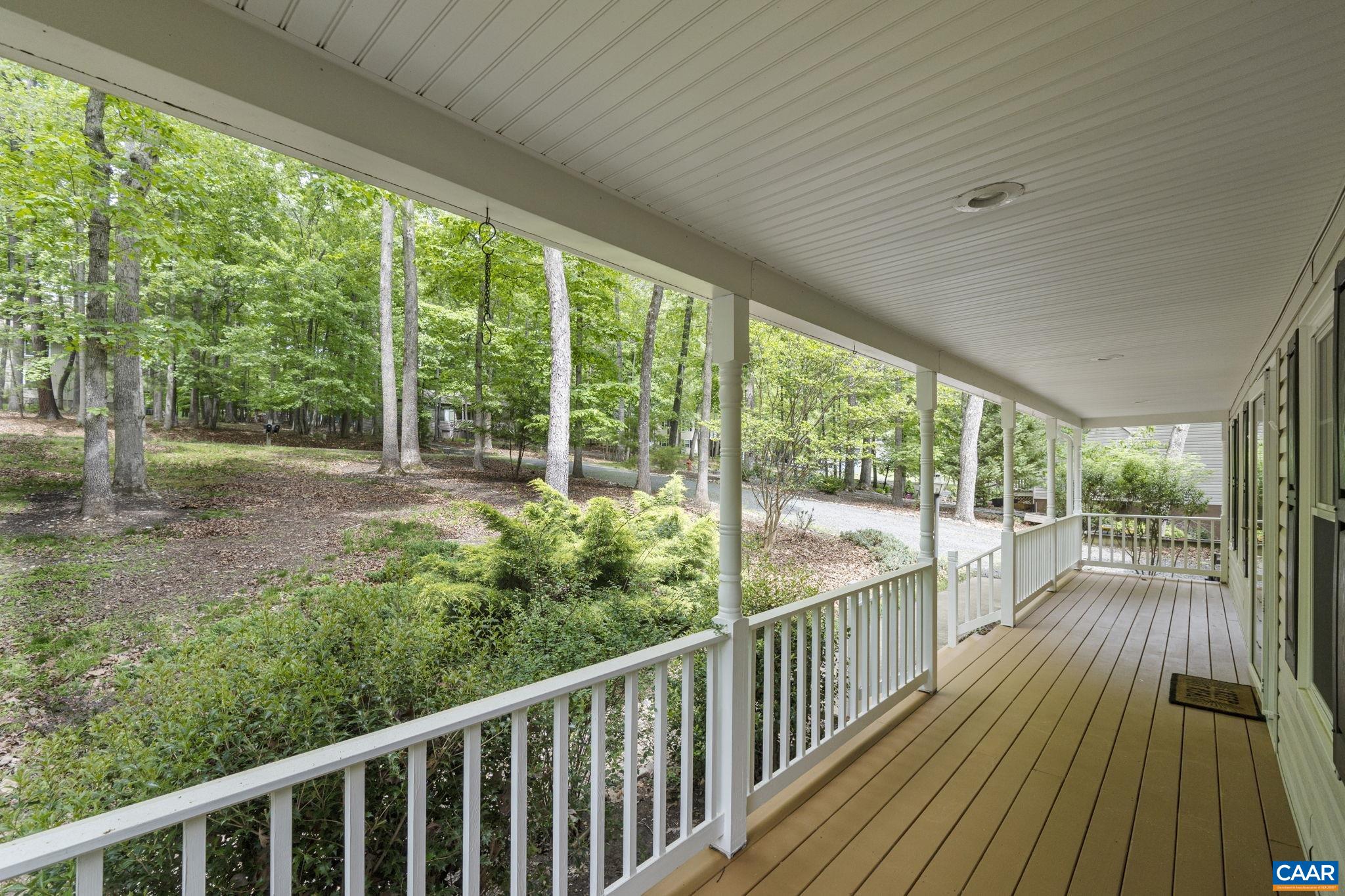 42 Oak Grove Road Palmyra, VA 22963 - Photo 4 of 37 a view of a porch with wooden floor and outdoor space