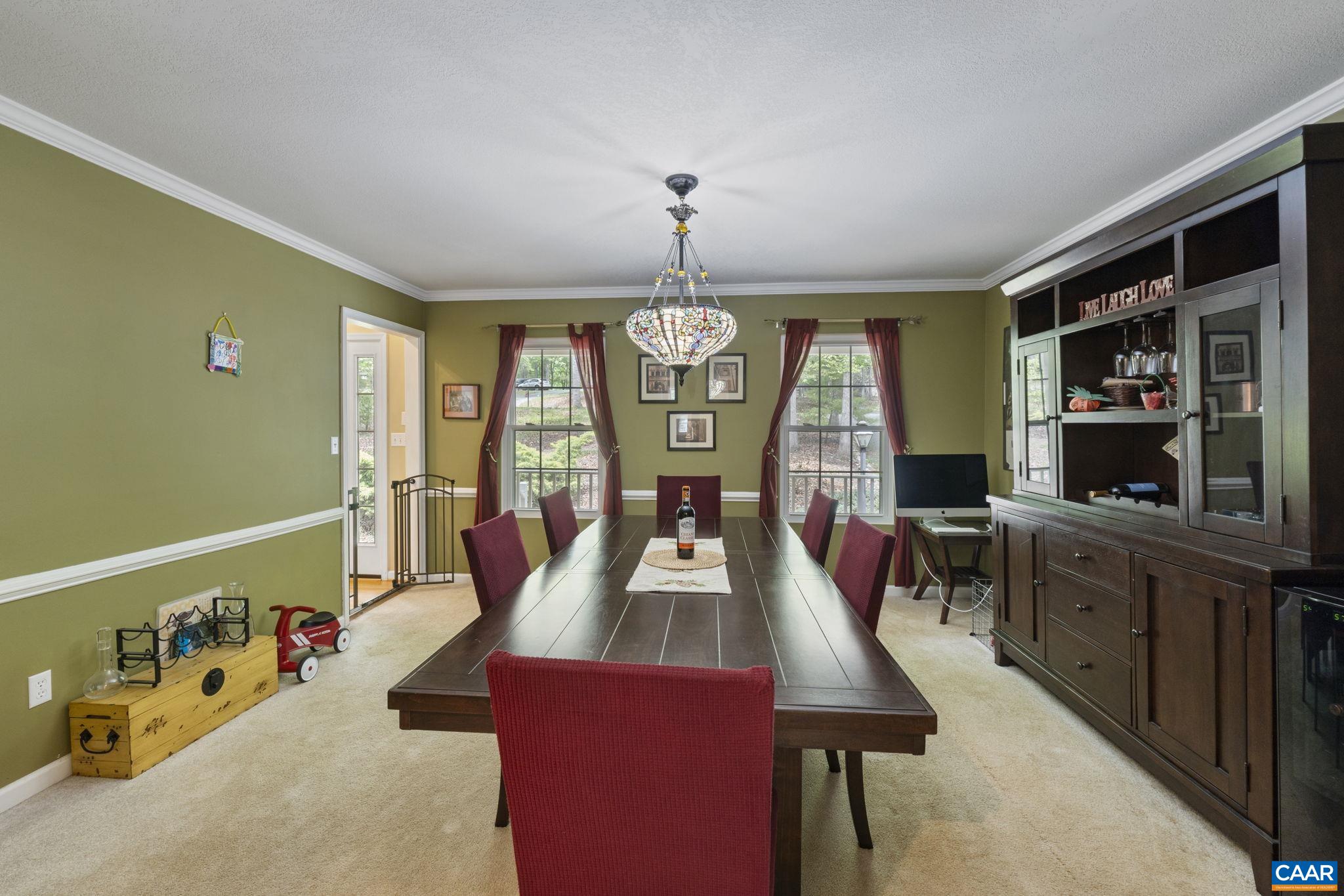 42 Oak Grove Road Palmyra, VA 22963 - Photo 7 of 37 a view of a dining room with furniture window and outside view