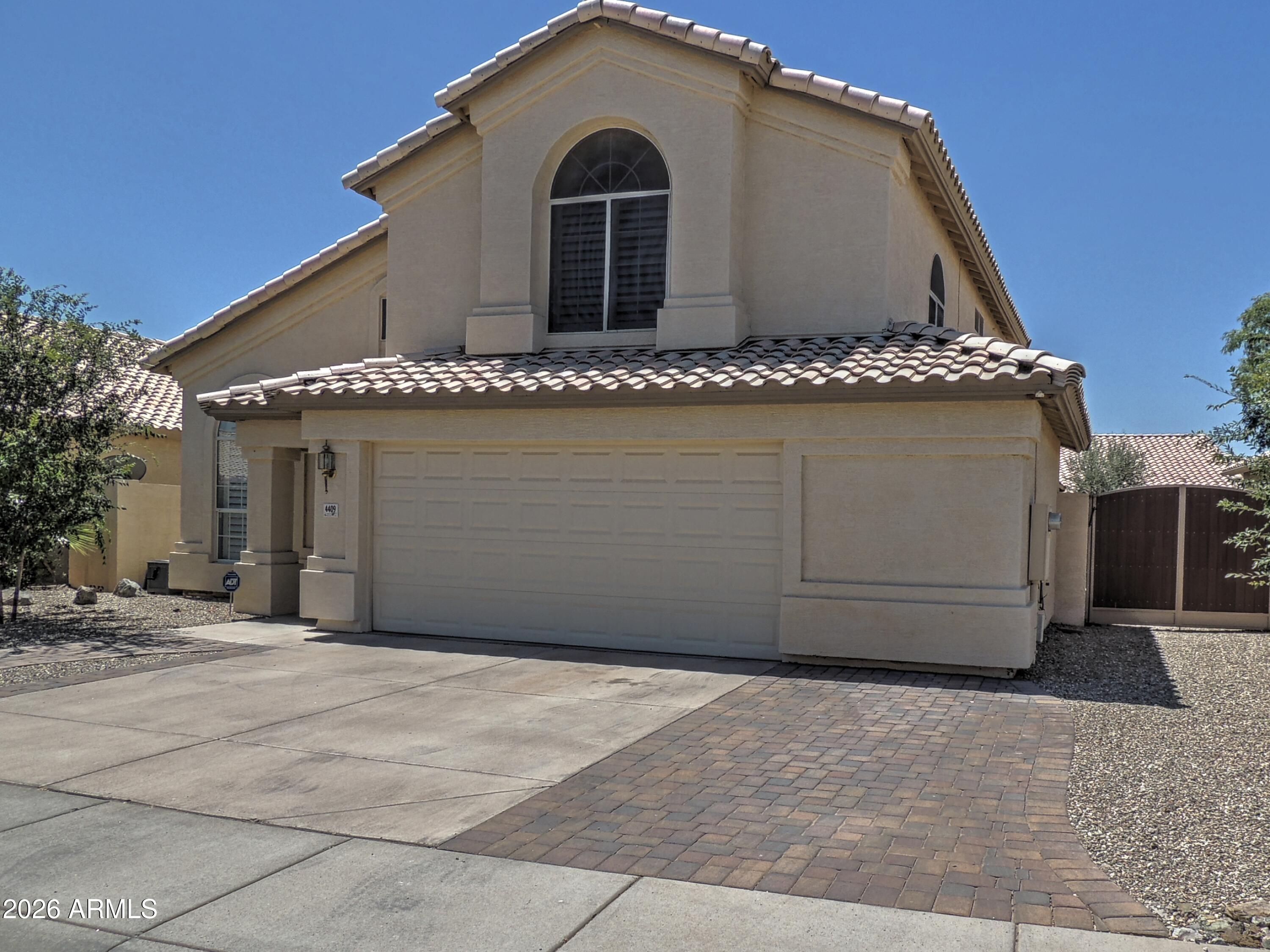 4409 East Dry Creek Road Phoenix, AZ 85044 - Photo 3 of 34 a front view of a house