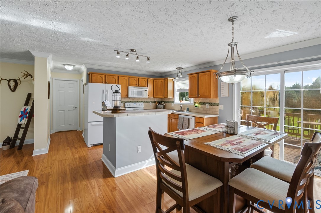 Kitchen featuring wood-finish flooring, wood cabin