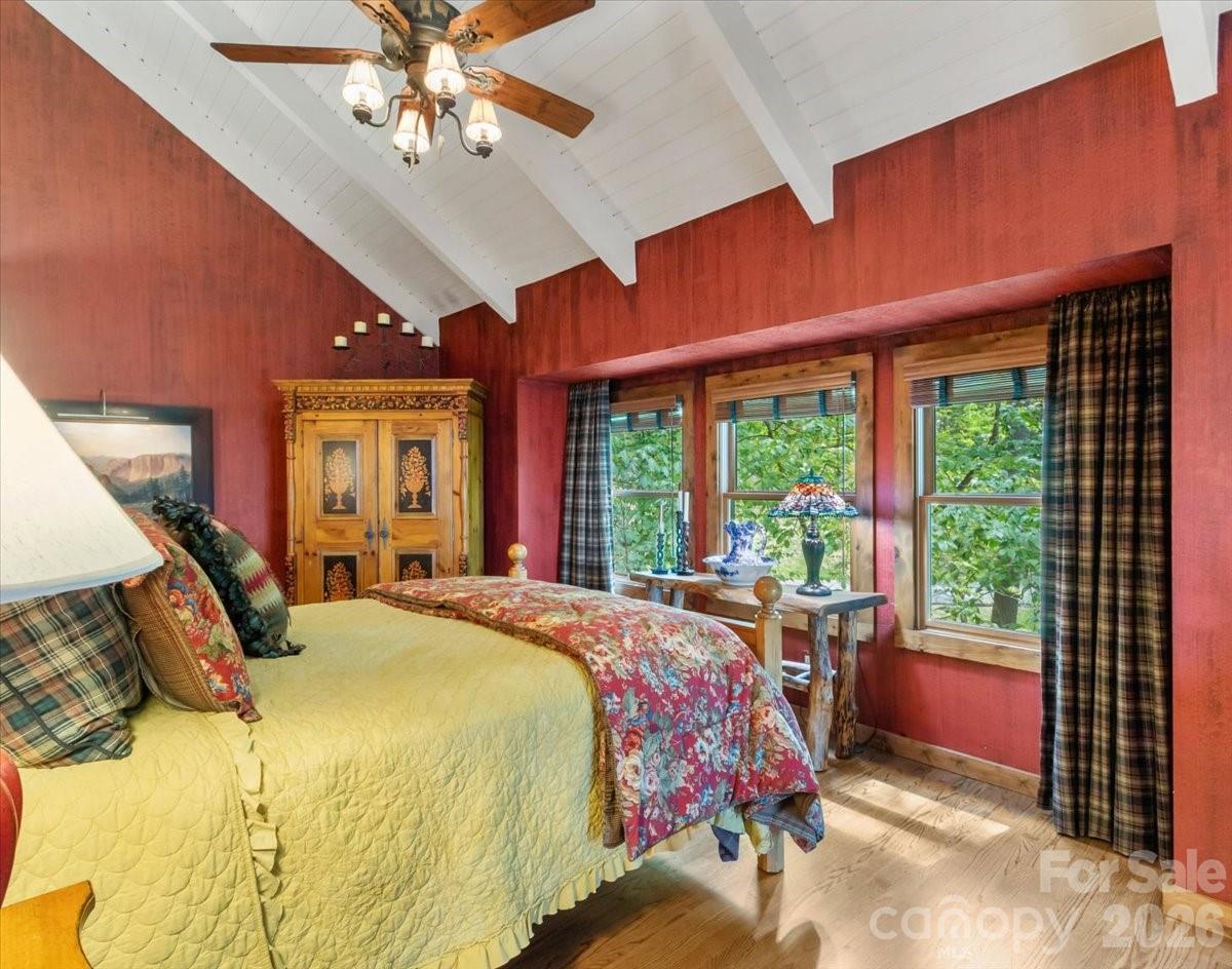 121 Ivy Ridge Road Burnsville, NC 28714 - Photo 16 of 48 a bedroom with a bed and a large window