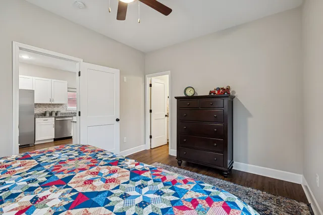 a bedroom with a bed and a cabinets
