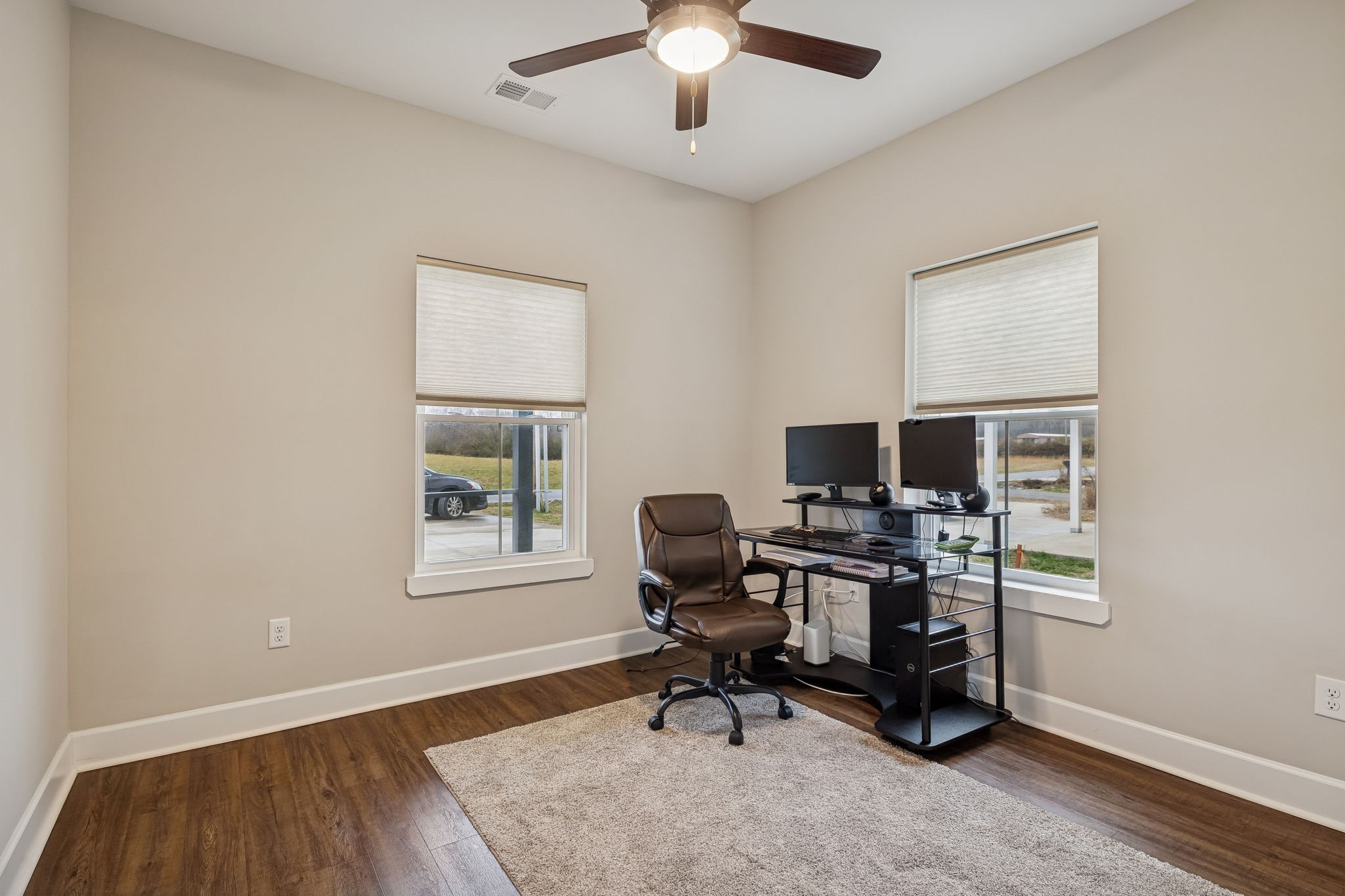 130 Eno Road Dickson, TN 37055 - Photo 14 of 17 a workspace with wooden floor and a window