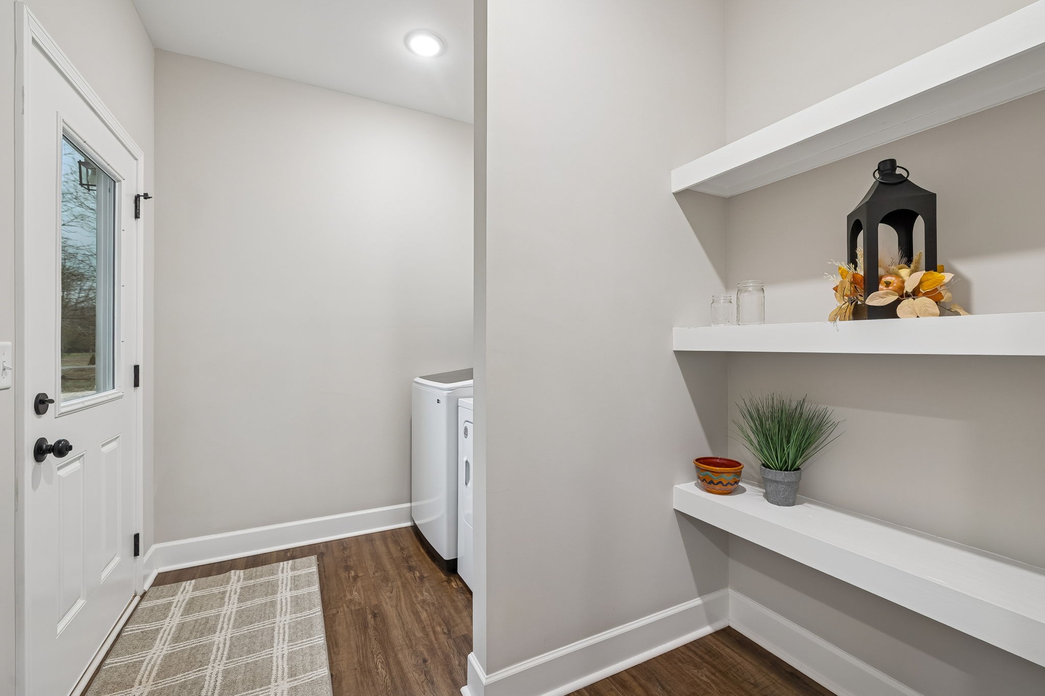 130 Eno Road Dickson, TN 37055 - Photo 16 of 17 a room with wooden floor and potted plant