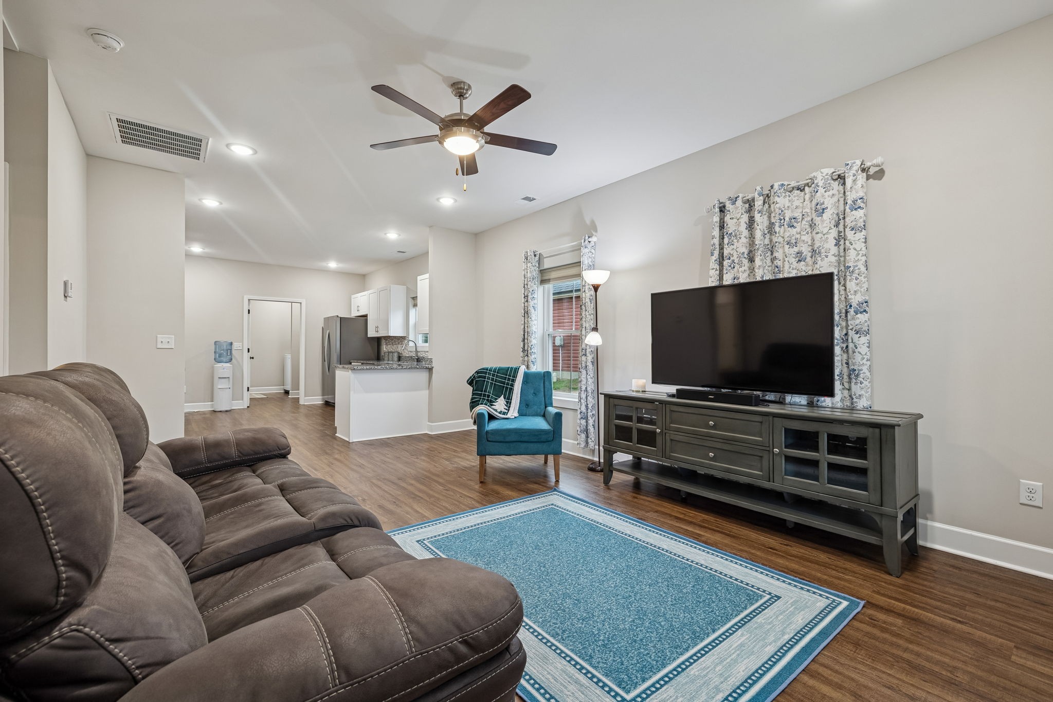 130 Eno Road Dickson, TN 37055 - Photo 6 of 17 a living room with furniture and a flat screen tv