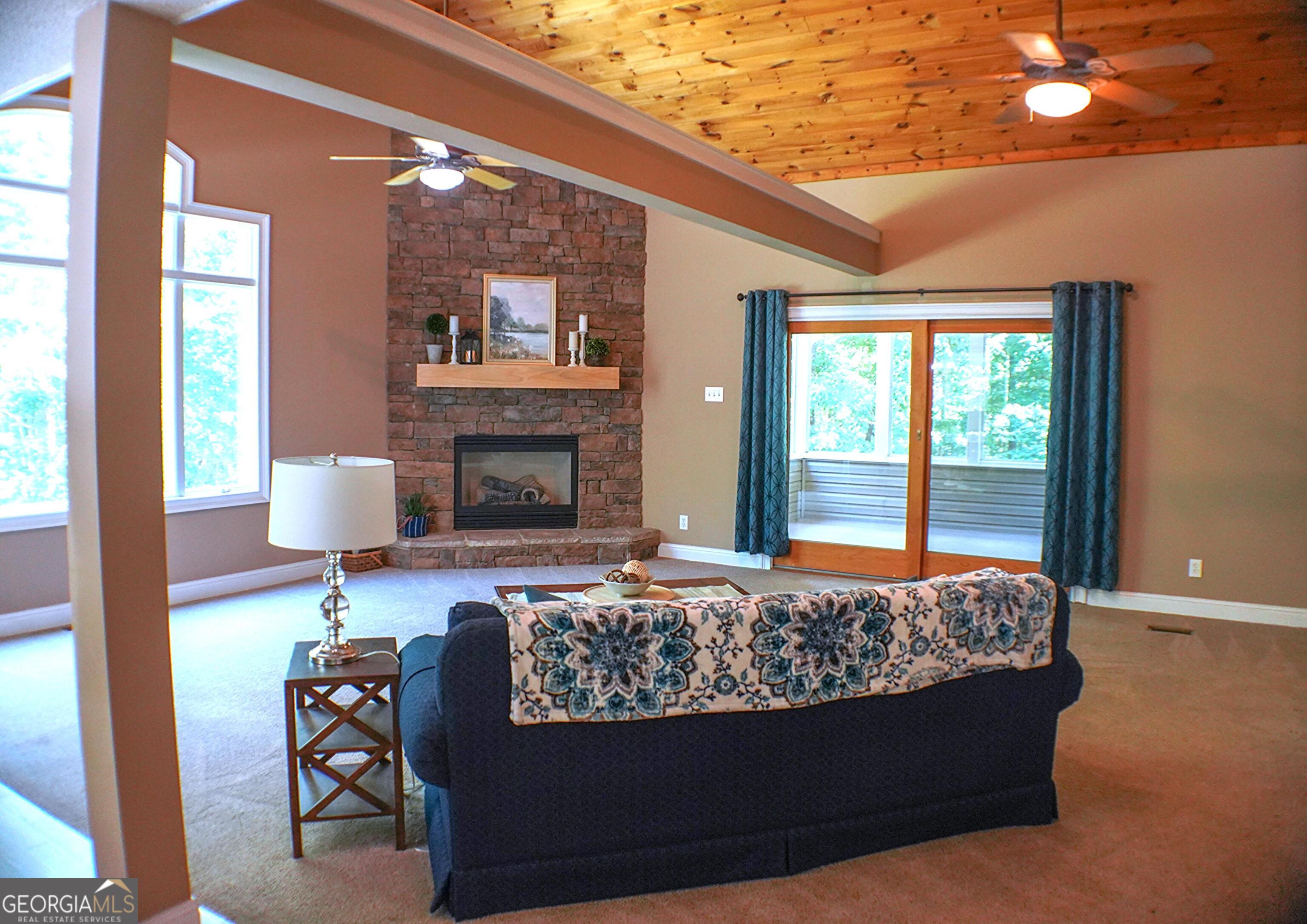 335 Winding Stream Trail Hampton, GA 30228 - Photo 7 of 35 a bed sitting in a spacious bedroom next to a window