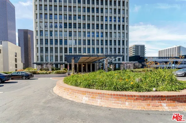 a view of a patio with a garden