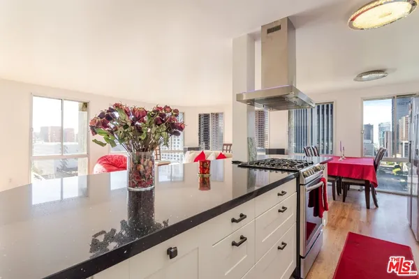 a kitchen that has a lot of cabinets