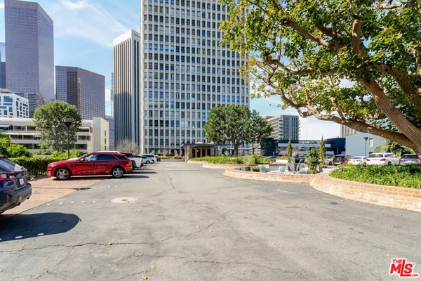a view of a street with cars