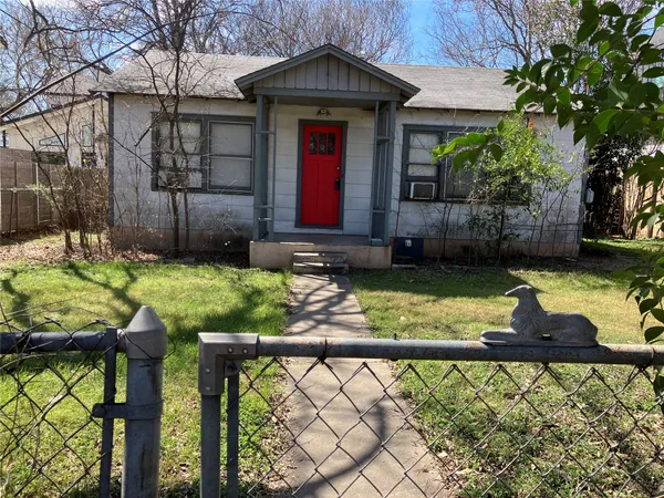 a house with trees in front of it