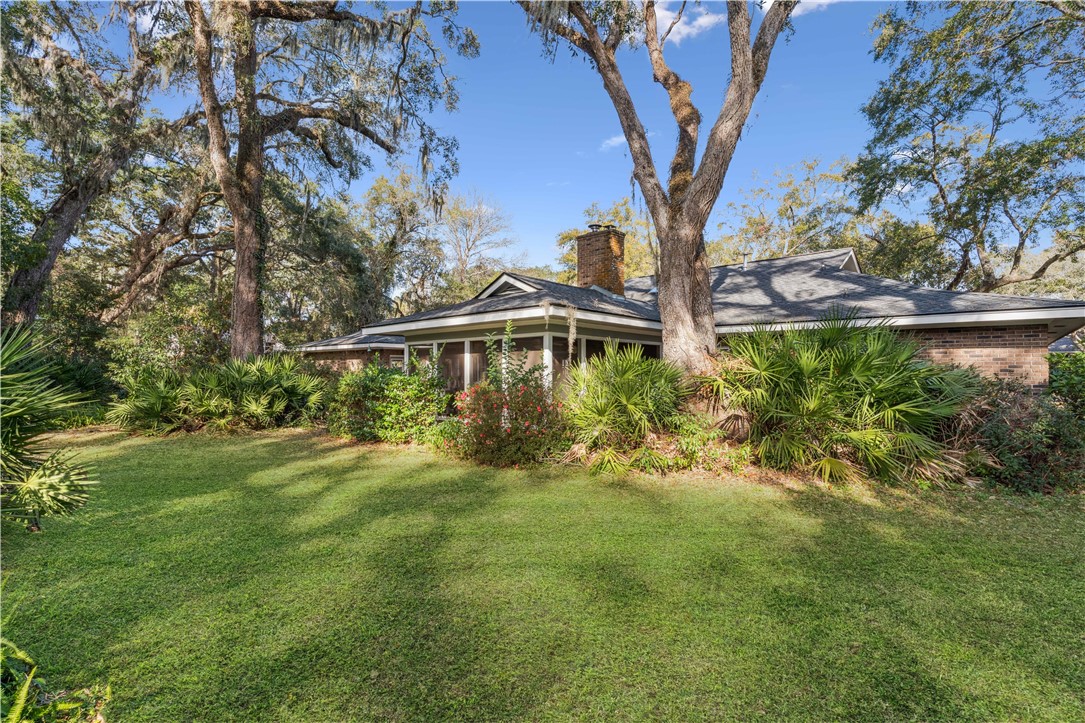 219 Five Pounds Road St. Simons Island, GA 31522 - Photo 2 of 27 Breezeway to garage