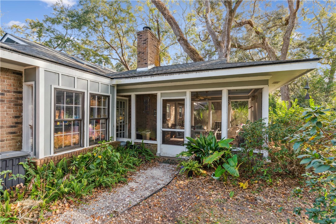 219 Five Pounds Road St. Simons Island, GA 31522 - Photo 23 of 27 Kitchen window bump out; large screened porch