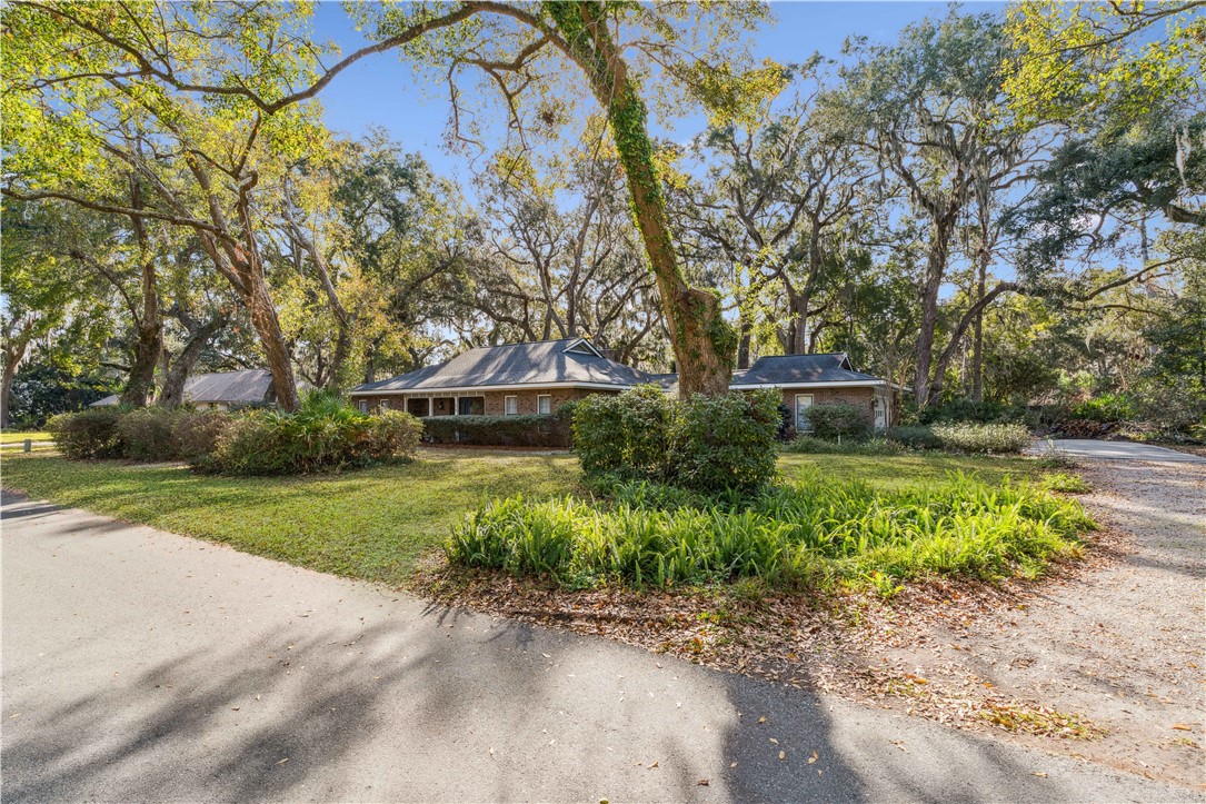 219 Five Pounds Road St. Simons Island, GA 31522 - Photo 26 of 27 Mature landscaping