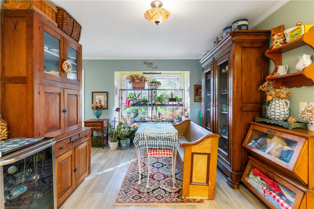 219 Five Pounds Road St. Simons Island, GA 31522 - Photo 8 of 27 Breakfast area with huge bump out window