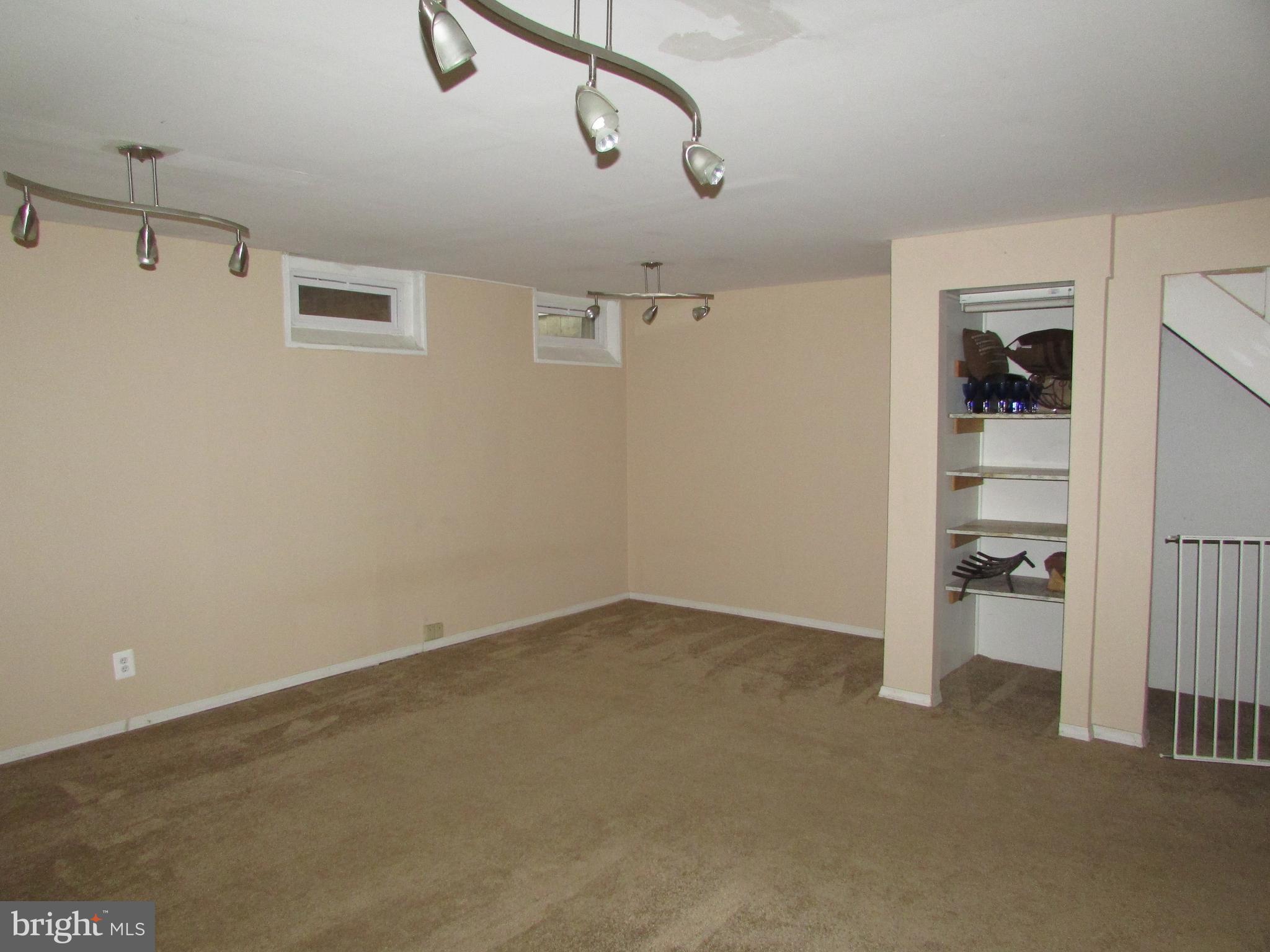 35 Cavan Green Baltimore, MD 21236 - Photo 13 of 16 a view of a room with racks on the wall