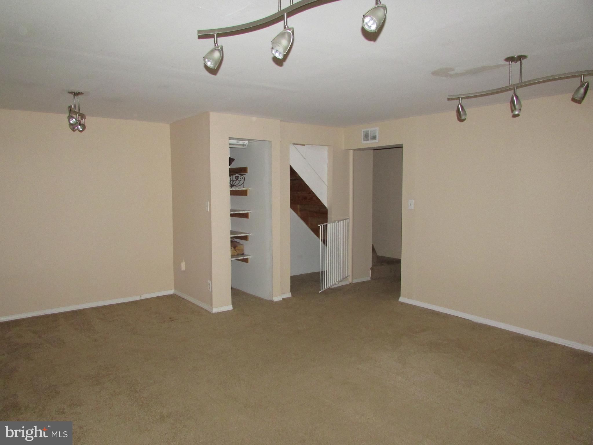 35 Cavan Green Baltimore, MD 21236 - Photo 14 of 16 a view of an empty room with a ceiling fan