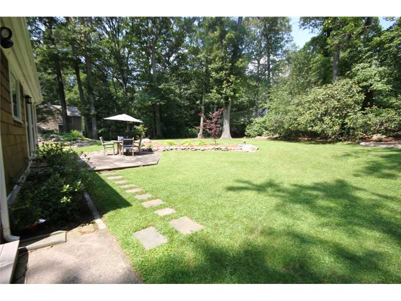 6 Little Brook Road Rowayton, CT 06853 - Photo 20 of 23 a view of a backyard with plants and patio