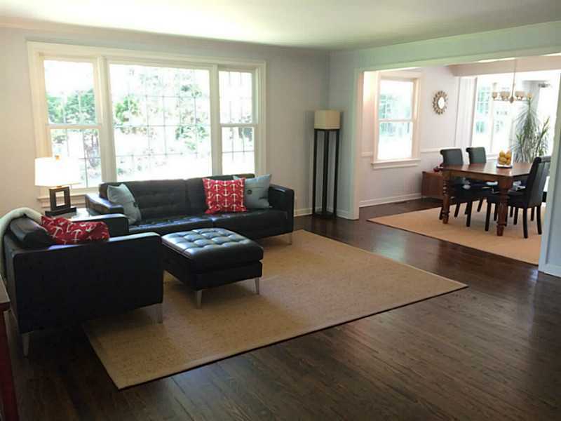 6 Little Brook Road Rowayton, CT 06853 - Photo 3 of 23 a living room with furniture and a large window