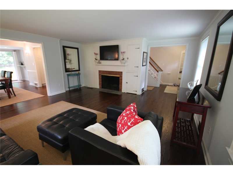 6 Little Brook Road Rowayton, CT 06853 - Photo 4 of 23 a bedroom with furniture and a fireplace