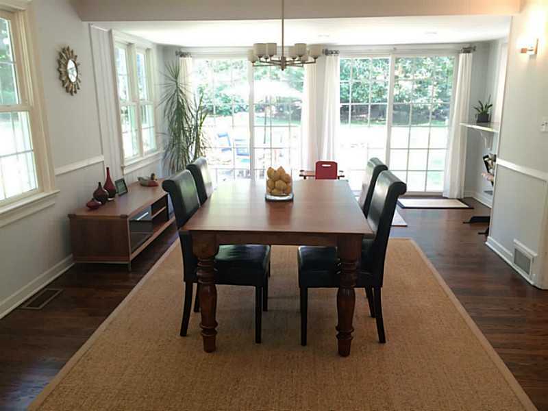 6 Little Brook Road Rowayton, CT 06853 - Photo 5 of 23 a view of a dining room with furniture window and outside view