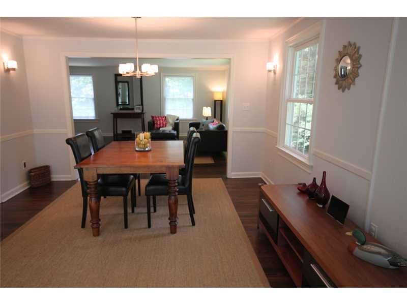 6 Little Brook Road Rowayton, CT 06853 - Photo 6 of 23 a view of a dining room with furniture and wooden floor
