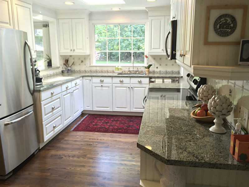 6 Little Brook Road Rowayton, CT 06853 - Photo 8 of 23 a kitchen with stainless steel appliances granite countertop a sink stove and refrigerator