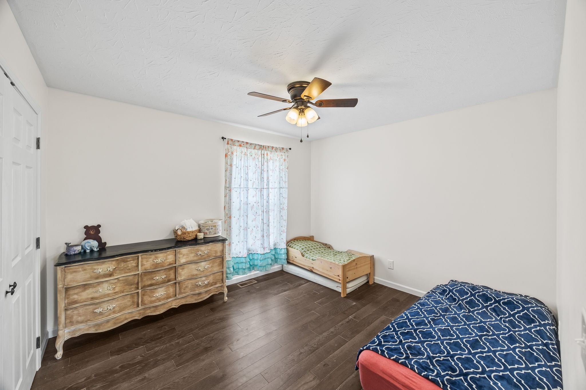 13723 Old Kentucky Road Walling, TN 38587 - Photo 14 of 34 a living room with furniture and a window