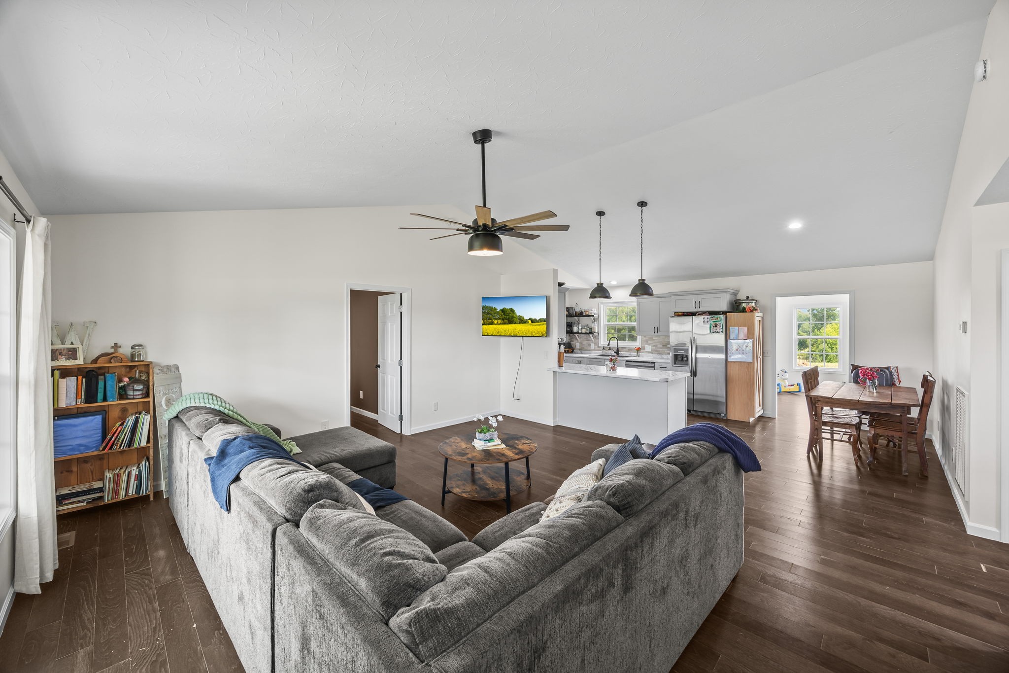 13723 Old Kentucky Road Walling, TN 38587 - Photo 3 of 34 a living room with furniture and a chandelier