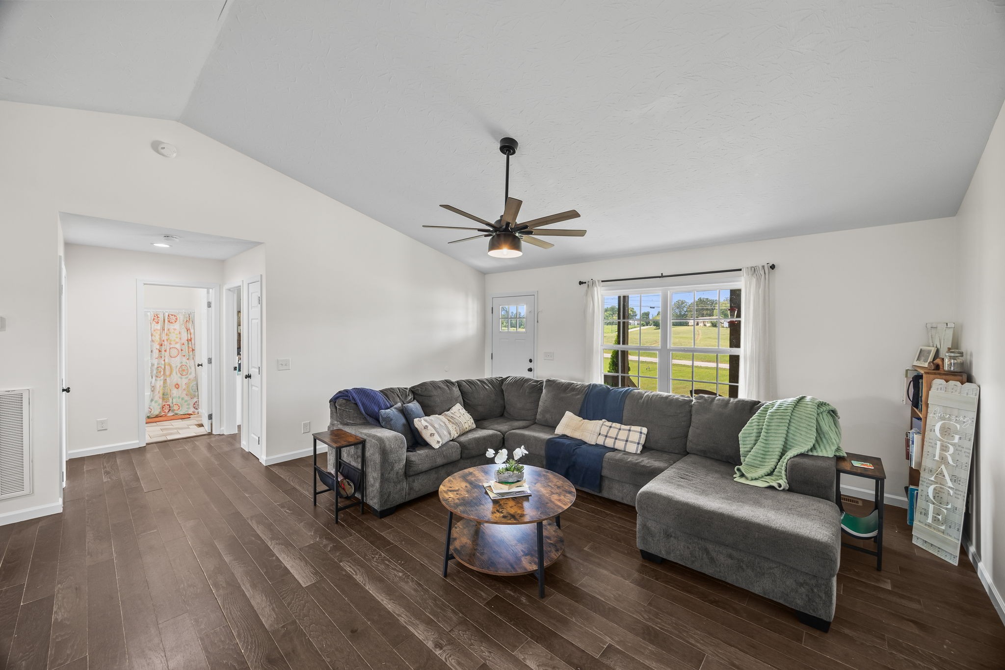 13723 Old Kentucky Road Walling, TN 38587 - Photo 4 of 34 a living room with furniture and wooden floor