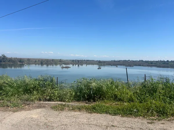a view of a lake with outdoor space