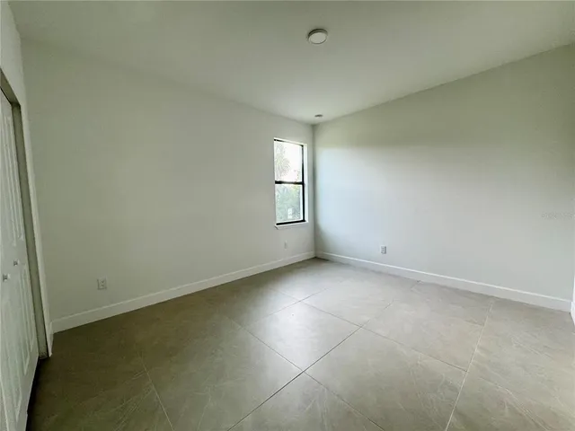 an empty room with a bathroom