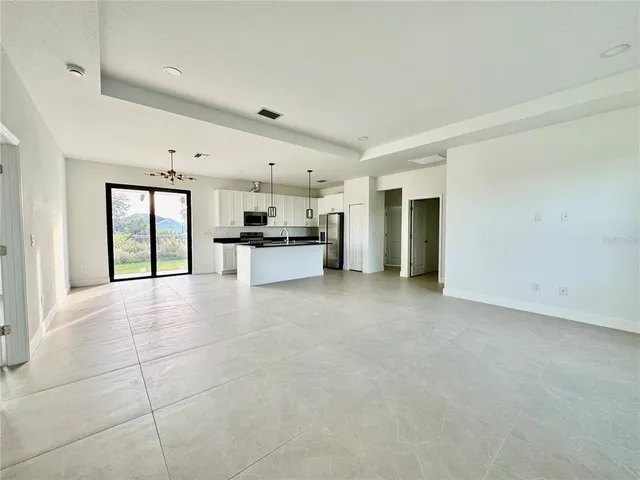 a view of a livingroom with furniture and cabinets