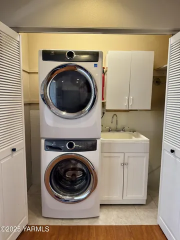 a utility room with dryer and washer