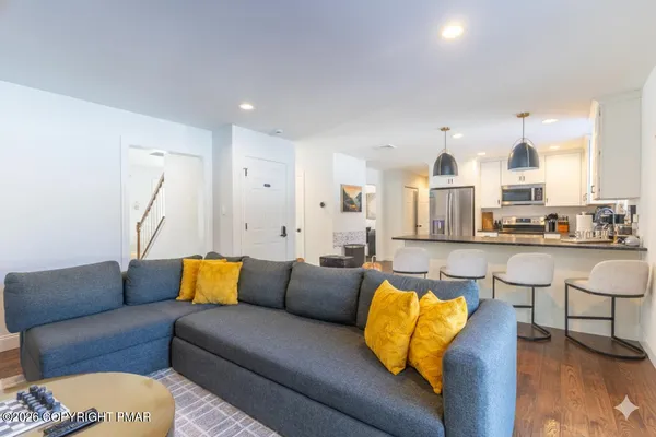 a living room with furniture and a couch