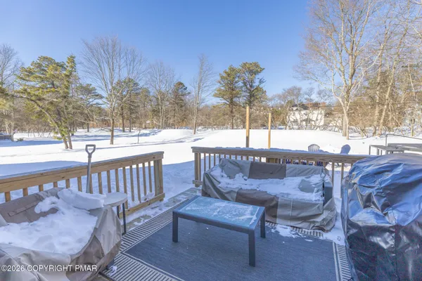 a view of a patio with a yard